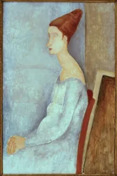Jeanne Hebuterne seduta, di profilo